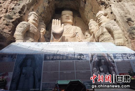 時下，中國“石窟鼻祖”天梯山石窟第13窟大佛足部與局部危巖體搶救性保護項目正在施工。圖為施工現(xiàn)場。陳曉斌 攝