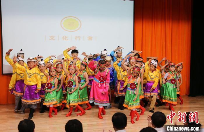 圖為蘭州大學(xué)文化行者團(tuán)隊(duì)走進(jìn)民族社區(qū)，開展系列活動(dòng)。(資料圖)蘭州大學(xué)供圖